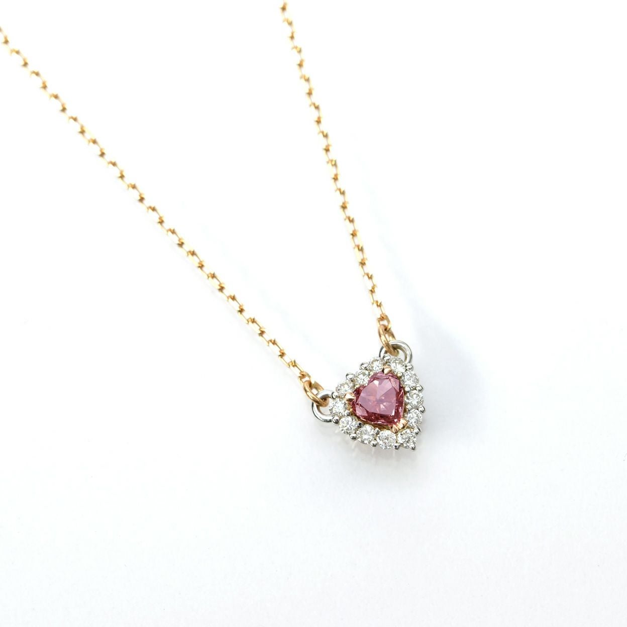 ピンクダイヤモンド0.16ct FANCY ORANGY PINK ハートカットPGK18