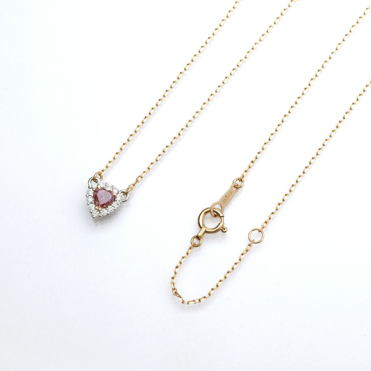 ピンクダイヤモンド0.16ct FANCY ORANGY PINK ハートカットPGK18