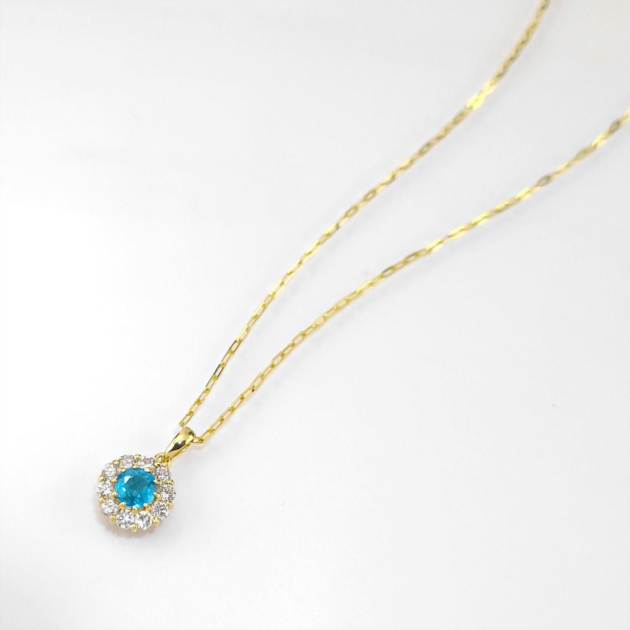 ブラジル産バターリャ鉱山パライバトルマリン0.58ctK18ゴールドネックレス0.59ctダイア付(GRS宝石鑑別書付)