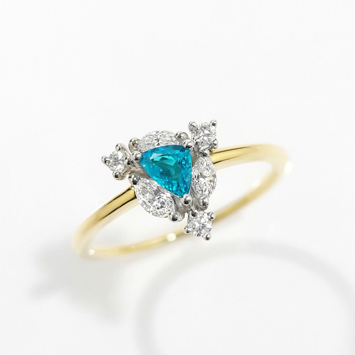 ブラジル産バターリャ鉱山パライバトルマリン0.18ctプラチナK18ゴールドリングダイア0.24ct付(中央宝石研究所宝石鑑別書付)