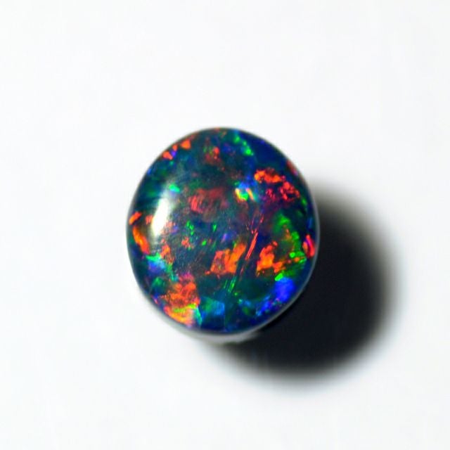 ブラックオパールカボション0.63ct(中央宝石研究所宝石鑑別書付)