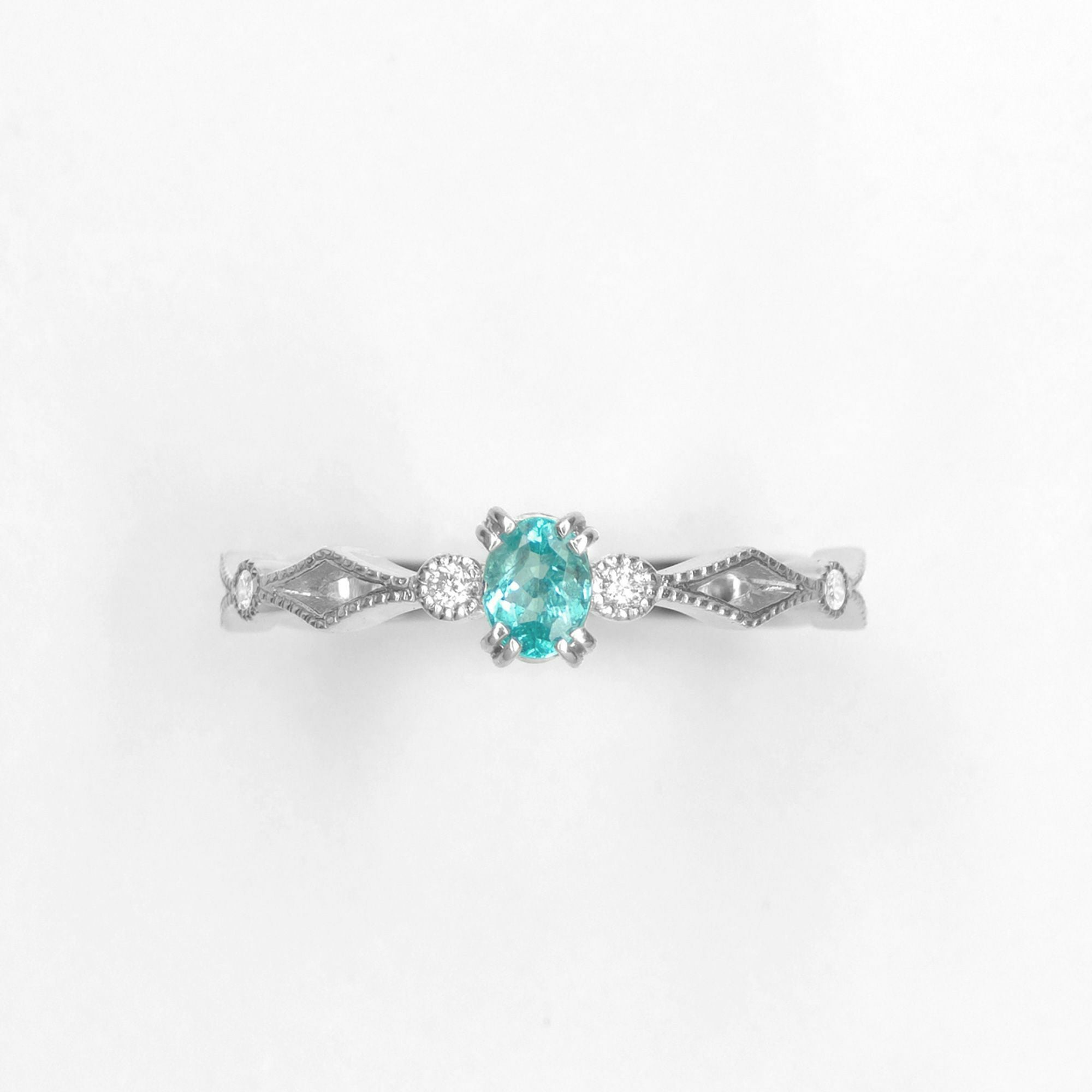 パライバトルマリン0.19ctK18ホワイトゴールドリングダイヤ0.04ct付(中央宝石研究所宝石鑑別書)