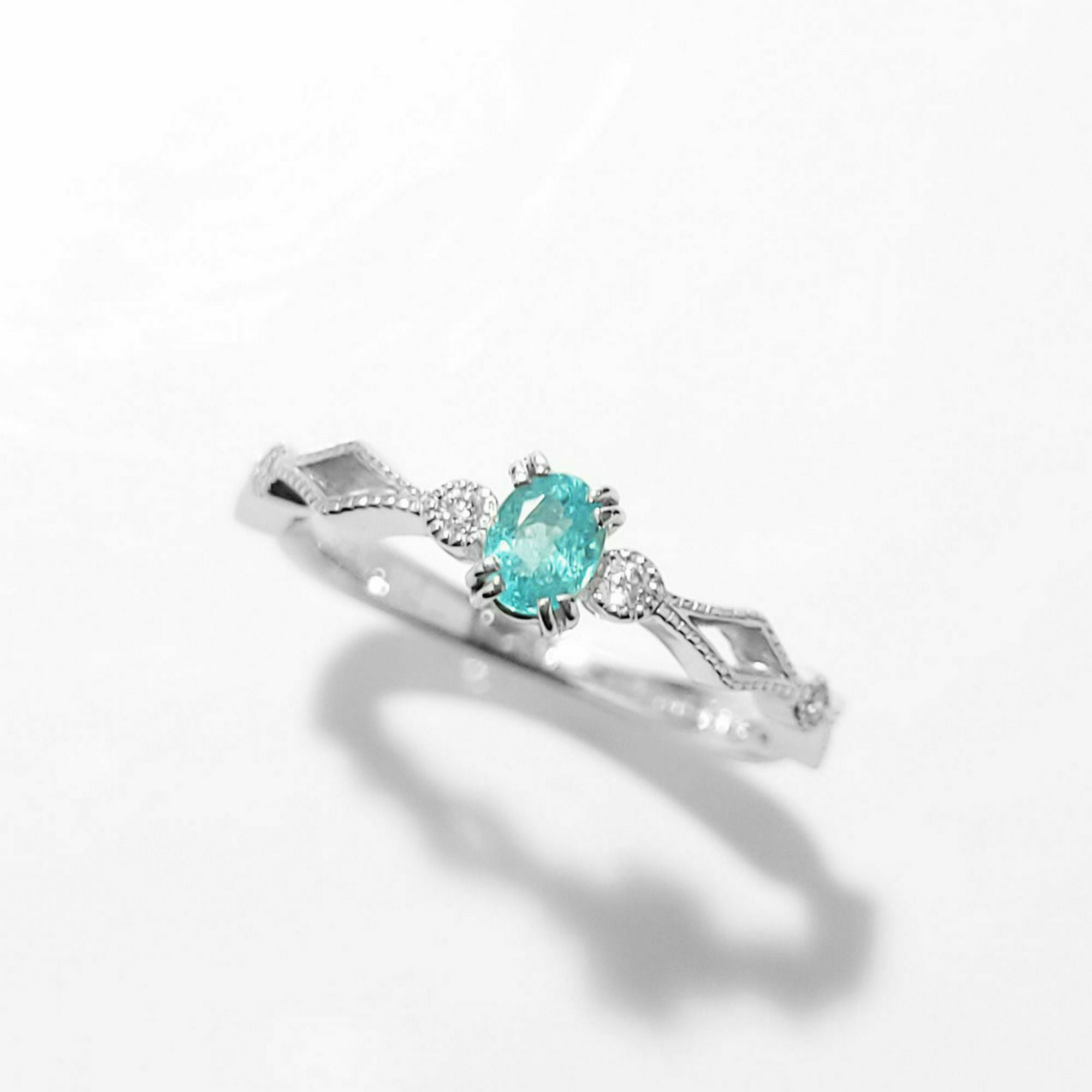 パライバトルマリン0.19ctK18ホワイトゴールドリングダイヤ0.04ct付(中央宝石研究所宝石鑑別書)